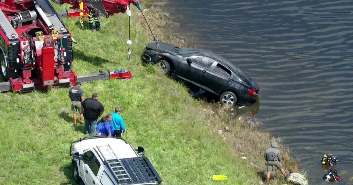 Police investigate car pulled from Sunrise canal