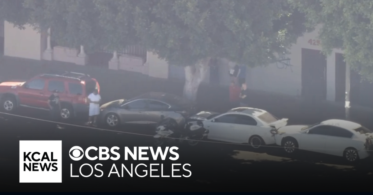 Driver hospitalized after slamming into row of parked cars near South ...