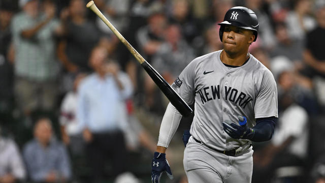 Juan Soto #22 of the New York Yankees tosses his bat after a solo home run in the seventh inning against the Chicago White Sox at Guaranteed Rate Field on August 13, 2024 in Chicago, Illinois. 