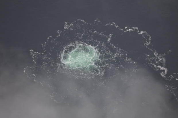 A handout photo provided by the Swedish coast guard shows the release of gas emanating from a leak on the Nord Stream 2 gas pipeline in the Baltic Sea on Sept. 28, 2022. 