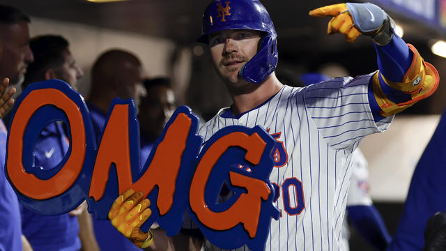 Pete Alonso #20 of the New York Mets celebrates in the dugout after hitting a home run during the fourth inning against the Oakland Athletics at Citi Field on August 14, 2024 in New York City. 