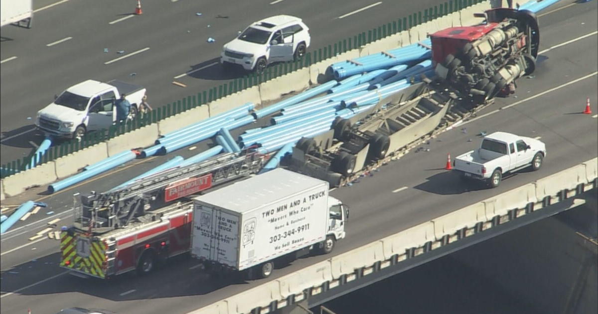 3 dead when semi-trailer truck rolls over, crash leads to lane closures on I-70 near Ward Road northwest of Denver