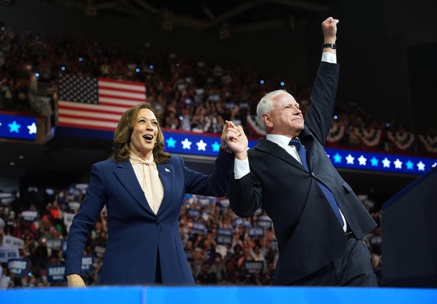 Vice President Kamala Harris and Minnesota Governor Tim Walls greet supporters during a campaign event at Temple University in Philadelphia on August 6, 2024.
