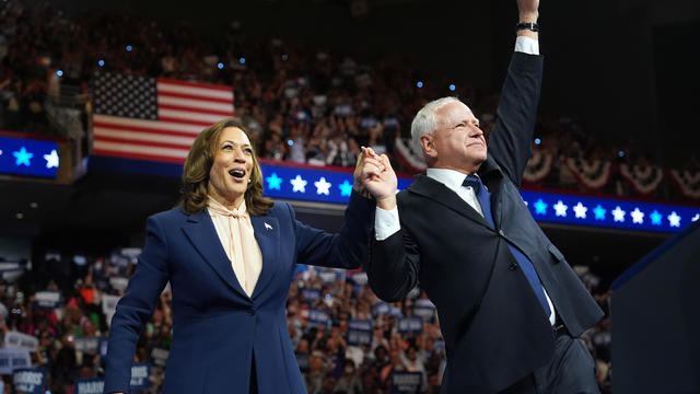 Democratic presidential candidate, U.S. Vice President Kamala Harris and Democratic vice presidential candidate Minnesota Gov. Tim Walz greet supporters during a campaign event at the Liacouras Center at Temple University on August 6, 2024 in Philadelphia, Pennsylvania. 