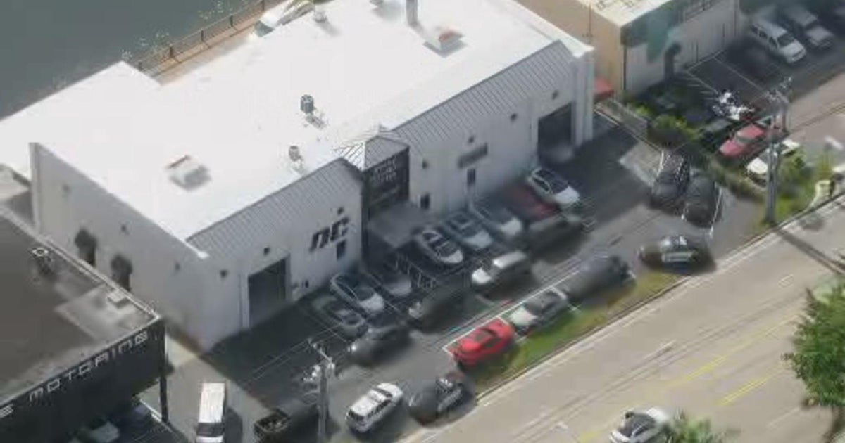 FBI raids Doral body shop connected to attempted murder of Miami car designer, sources say FBI raids Doral body shop connected to attempted murder of Miami car designer, sources say