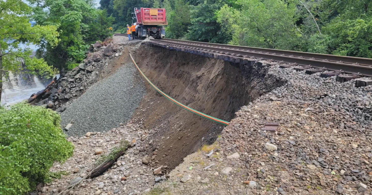 Photos and videos show extensive flood damage in Connecticut and New York