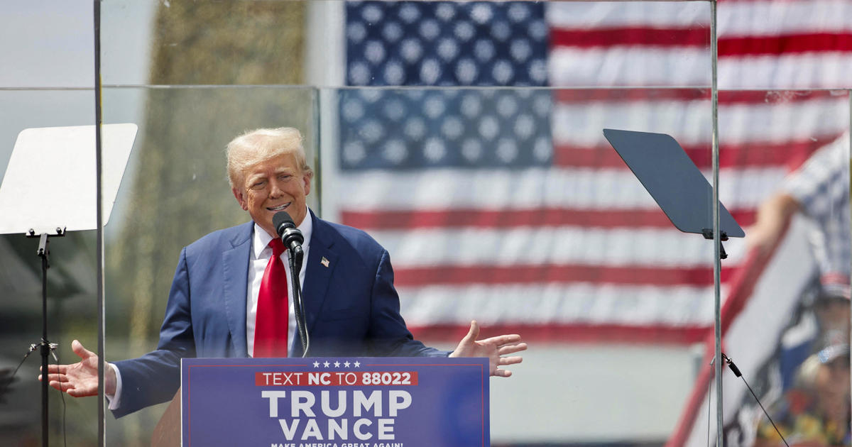 Trump returns to outdoor rallies, now surrounded by bulletproof glass