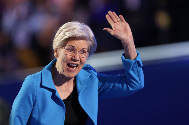 Sen. Elizabeth Warren of Massachusetts waves as she leaves the stage after speaking on the fourth and last day of the Democratic National Convention at the United Center in Chicago on Aug. 22, 2024. 