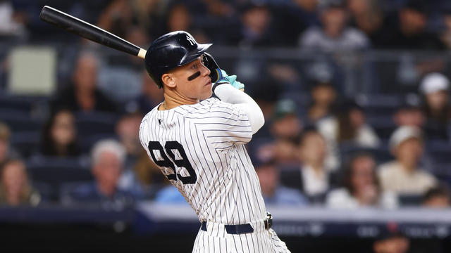 Aaron Judge #99 of the New York Yankees hits his second home run of the game in the seventh inning against the Cleveland Guardians at Yankee Stadium on August 21, 2024 in New York City. 