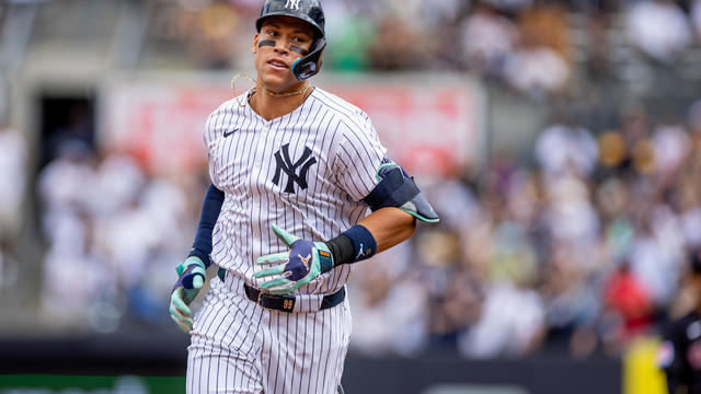 New York Yankees outfielder Aaron Judge (99) rounds the bases after hitting a solo home run during the MLB professional baseball game between the Cleveland Guardians and the New York Yankees on August 22, 2024 at Yankee Stadium in New York, NY. 