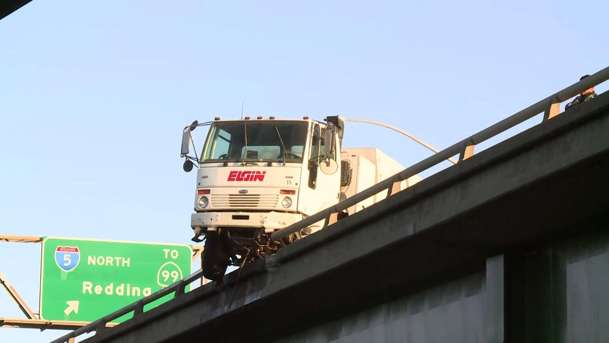 Street sweeper hangs off W/X Freeway in Sacramento after crash CBS