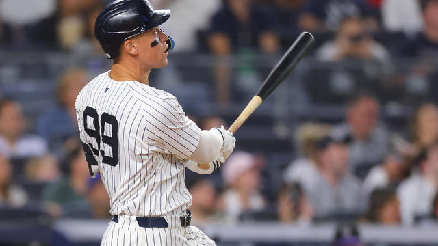 Aaron Judge #99 of the New York Yankees hits a home run in the sixth inning against the Colorado Rockies at Yankee Stadium on August 23, 2024 in New York City. 