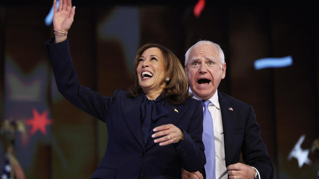 Democratic presidential nominee, Vice President Kamala Harris and Democratic vice presidential nominee Minnesota Gov. Tim Walz celebrate during the final day of the Democratic National Convention at the United Center on August 22, 2024 in Chicago, Illinois. 