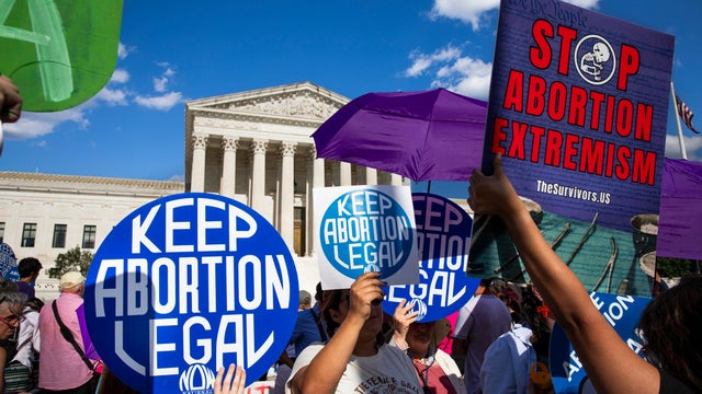 Abortion rights and anti-abortion rights activists are protesting in front of the Supreme Court in Washington, DC on June 24, 2024.