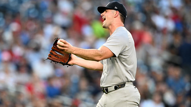 Carlos Rodón #55 of the New York Yankees reacts after being called for a balk in the first inning against the Washington Nationals at Nationals Park on August 28, 2024 in Washington, DC. 