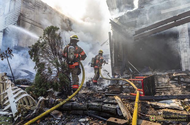 Small plane crashes into residential building near Portland, officials say 