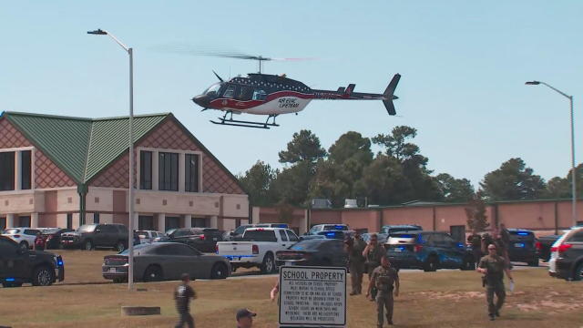 Law enforcement officers and first responders are seen outside Apalachee High School in Winder, Georgia, Sept. 4, 2024, in a screen capture from aerial footage. 