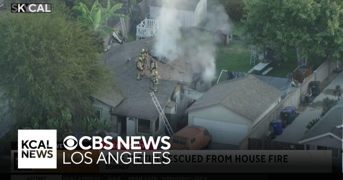 Downey firefighters rescue one person trapped in a house fire - CBS Los ...