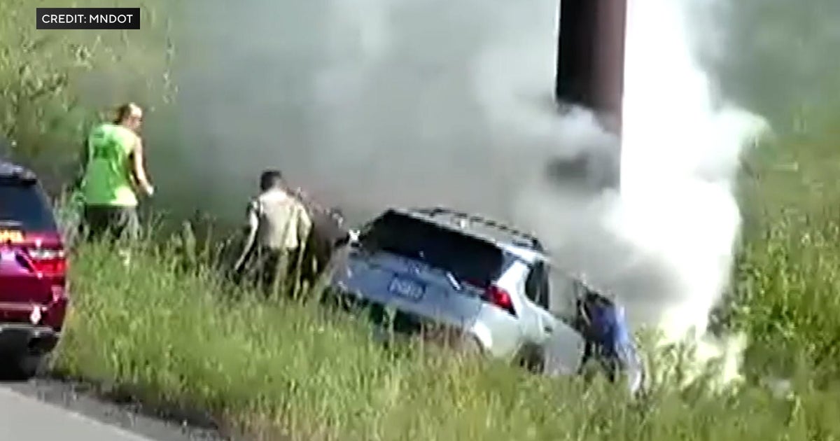 Video shows bystanders, trooper rescue driver from burning SUV on I-35W ...