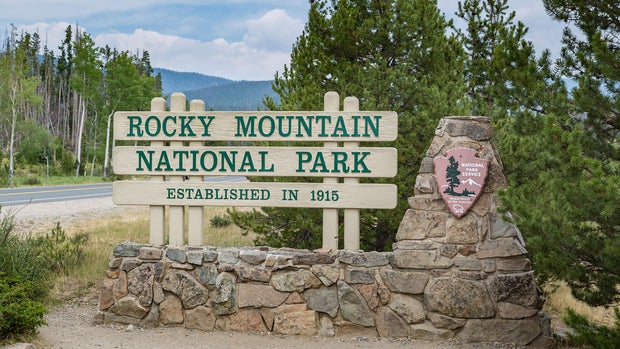 Sign near entrance to Rocky Mountain National Park in Colorado 