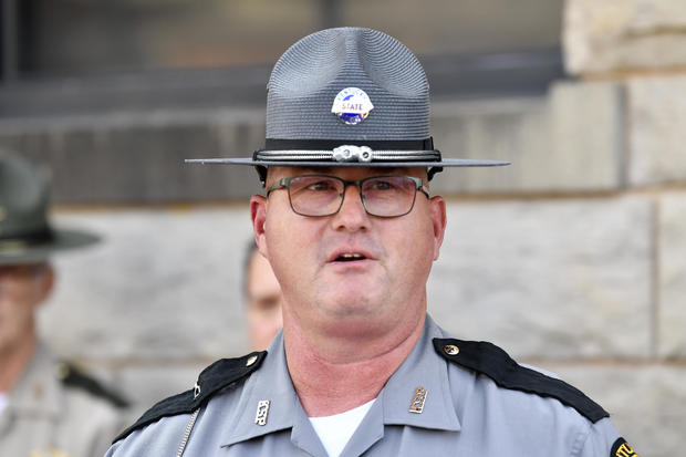 Kentucky State Police Master Trooper Scottie Pennington gives the media an update on the efforts to find the suspect in the shooting on Interstate 75, at the Laurel County Sheriff's Office in London, Kentucky, on Sept. 9, 2024. 