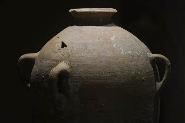 Ancient jar smashed by curious 4-year-old is back on display at museum after repairs