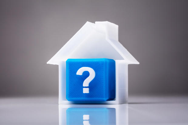 Blue Cube With Question Mark Sign Inside House Model 