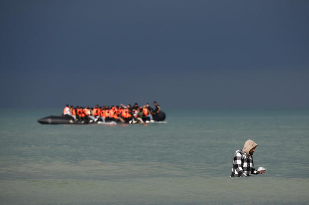 Migrants attempt to cross the English Channel, on the beach of the Slack dunes in Wimereux 