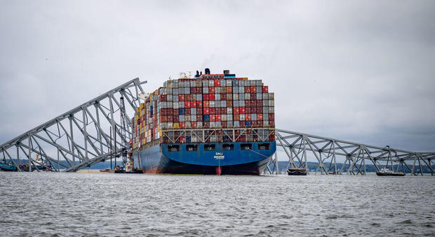 The container ship Dali is seen in the wreckage of Francis Scott Key Bridge almost a week after it hit a structural pier causing a subsequent bridge collapse, April 1, 2024. 