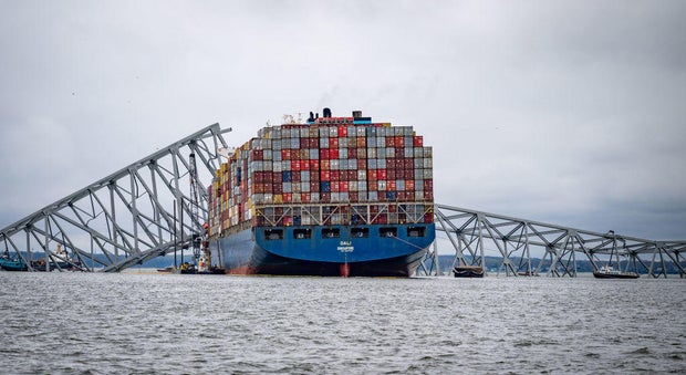 The container ship Dali is seen in the wreckage of Francis Scott Key Bridge almost a week after it hit a structural pier causing a subsequent bridge collapse, April 1, 2024.