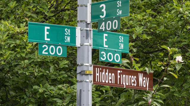 The street sign "Hidden Figures Way" is posted at NASA Headquarters in honor of African American women mathematicians who worked at NASA on June 26, 2020 in Washington, DC. 