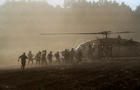 Israel's military evacuate injured people by helicopter after an anti-tank missile was fired into Israel from Lebanon, amid cross-border hostilities between Hezbollah and Israel, near Israel's border with Lebanon in northern Israel 