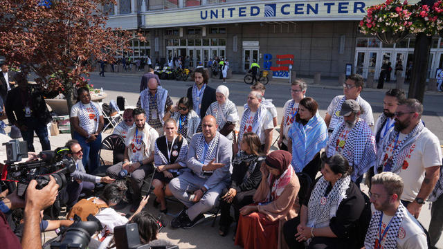 Uncommitted delegates protest in a sit-in outside on the final day of the Democratic National Convention at the United Center on Aug. 22, 2024, in Chicago. 