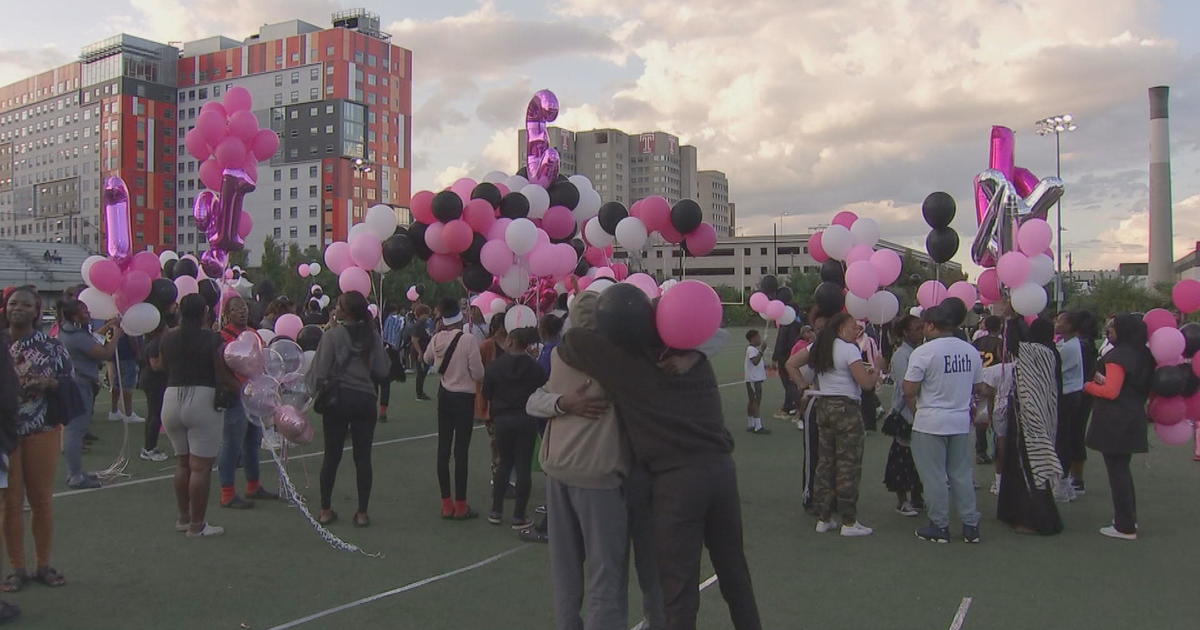 Family and friends of Alaysia Smith support each other at balloon release celebration