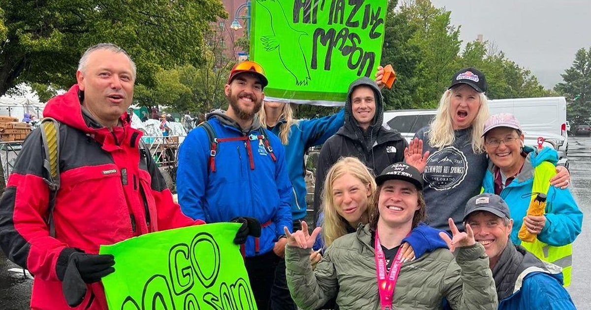 After being paralyzed skiing, this 20-year-old competed in his first marathon - CBS News