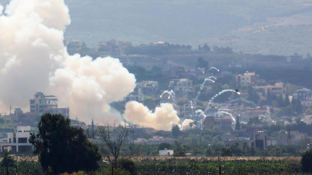 Smoke billows over southern Lebanon following Israeli strikes, as seen from Tyre, southern Lebanon 