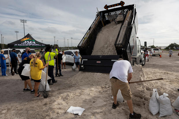 People fill up sandbags at Joe DiMaggio Sports Complex before Helene's expected landfall on Florida's Big Bend, in Clearwater, Florida, Sept. 25, 2024. 