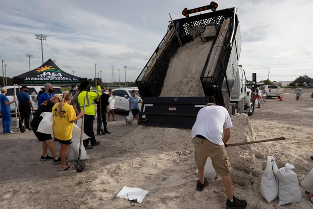 People fill up sandbags at Joe DiMaggio Sports Complex before Helene's expected landfall on Florida's Big Bend, in Clearwater, Florida, Sept. 25, 2024.