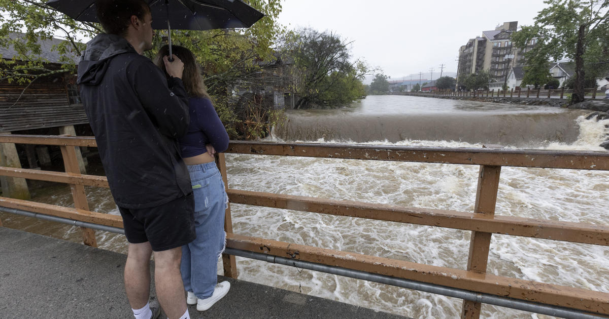 Dozens stranded on Tennessee hospital roof amid flooding; "dangerous" rescue underway