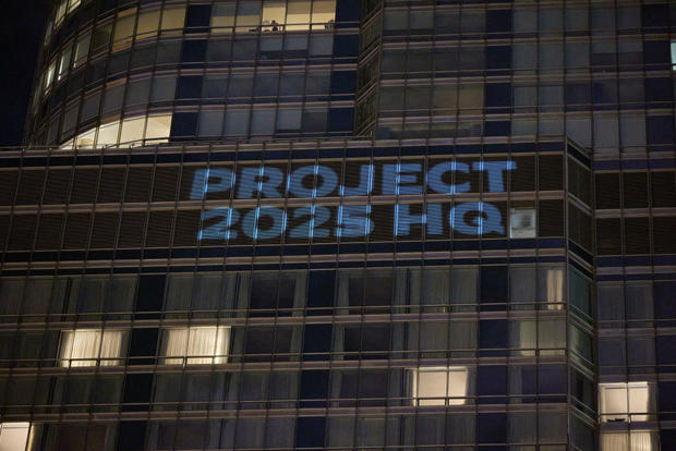 The Democratic National Committee Projects Images On Trump International Hotel In Chicago Ahead Of Their Convention In Chicago This Week 