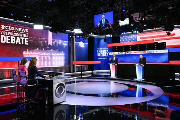 Sen. JD Vance and Minnesota Gov. Tim Walz participate in the vice presidential debate hosted by CBS News at the CBS Broadcast Center in New York City on Oct. 1, 2024. 