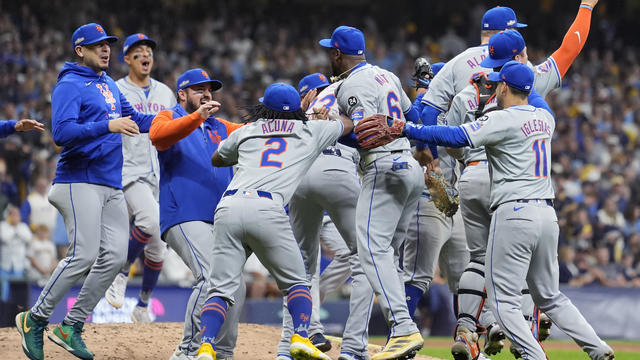 The New York Mets celebrate after beating the Milwaukee Brewers 4-2 in Game Three of the Wild Card Series at American Family Field on October 03, 2024 in Milwaukee, Wisconsin. 