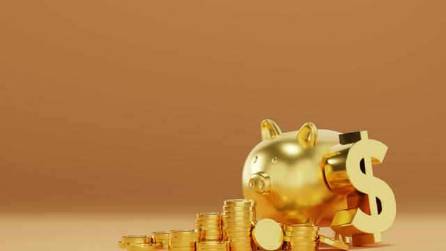 3D rendering Stack of golden coins with dollar sign and gold piggy bank on gold color background signifies financial abundance and successful investments. 