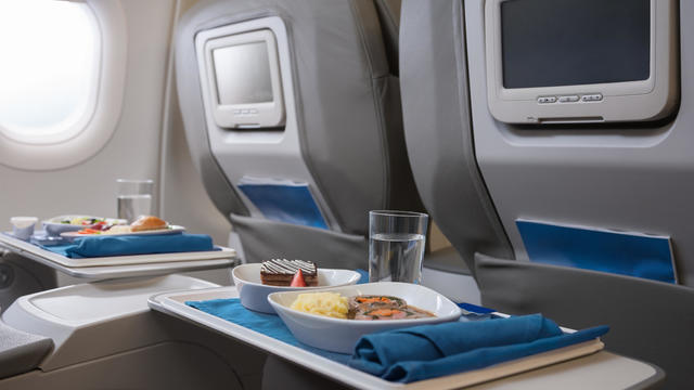 Airline meals served on seat tables 