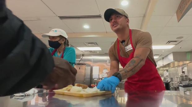 Sailors serving food at St. Anthony's during Fleet Week 