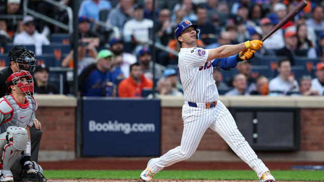 Pete Alonso #20 of the New York Mets hits a solo home run in the second inning of Game 3 of the Division Series presented by Booking.com between the Philadelphia Phillies and the New York Mets at Citi Field on Tuesday, October 8, 2024 in New York, New York. 