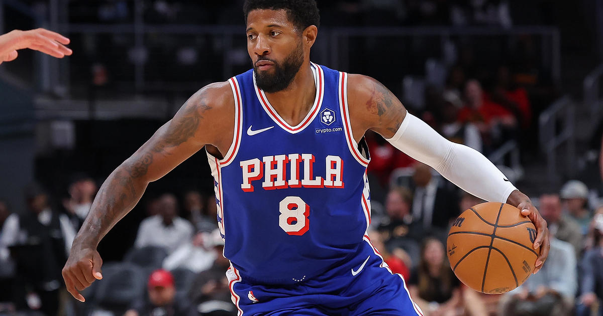 Paul George hyperextends his left knee during the preseason game between the Philadelphia 76ers and the Atlanta Hawks