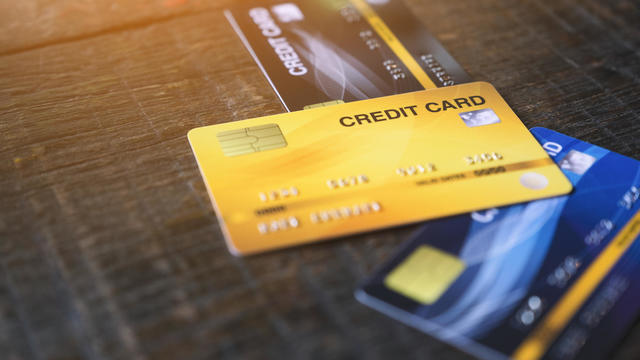 credit cards on wooden table 