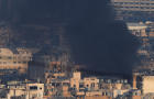 Smoke billows over Beirut's southern suburbs after an Israeli strike 