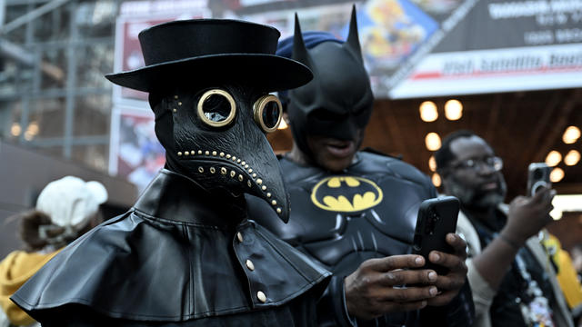 People wearing costumes and makeup visit New York Comic-Con 2024 held at Jacob K. Javits Center in New York, United States on October 17, 2024. 